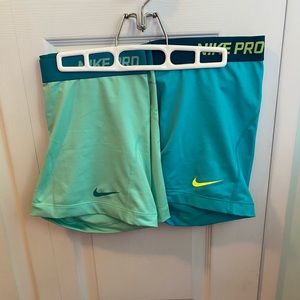 2 pairs of Nike Pro Shorts